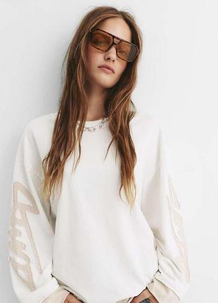 Лонгслів жіночий pull&bear молочний з написами