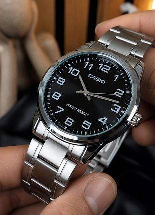 Годинники чоловічі casio mtp-v001d-1b сріблясті з чорним циферблатом