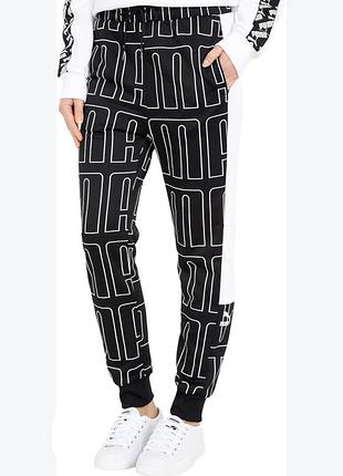 Спортивні штани жіночі puma womens track pant чорні з текстовим принтом