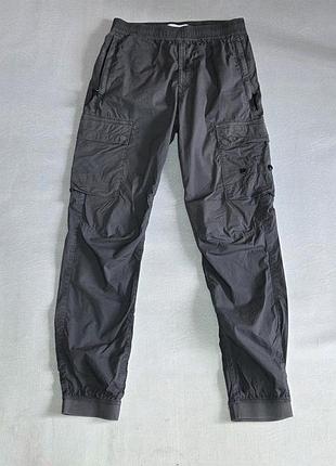 Фирменные брюки stone island, р. s