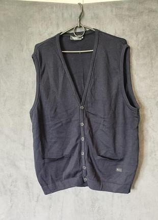 100%virgin wool.темно синий трикотажный жилет.