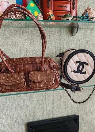 Жіноча сумка chanel кругла чорно-бежева