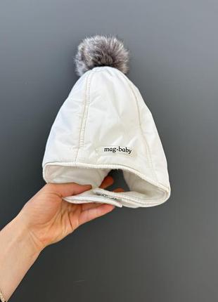 Шапка для дівчинки magbaby молочна зимова з помпоном 46-50 см