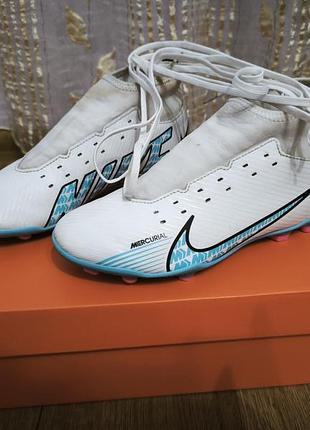 Бутси дитячі nike air zoom mercurial superfly 9 academy білі з бірюзовими та чорними елементами