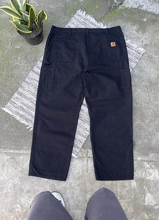 Вінтажні великого розміру чорні джинси carhartt карпентери з маленьким логотипом