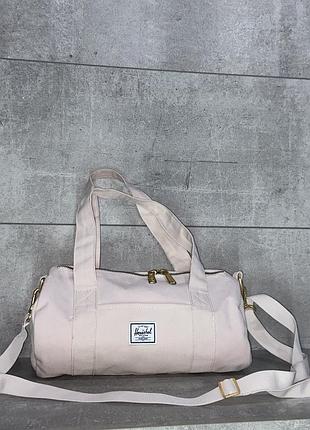 Світло-рожева міні-сумка-дафл herschel supply co. sutton mini