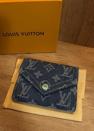 Гаманець lv monogram у денімі в поєднанні з натуральною шкірою.