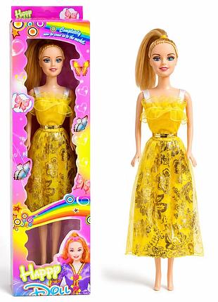 Лялька happy doll 30 см у жовтій сукні, довге волосся, модна зачіска, стильна упаковка.