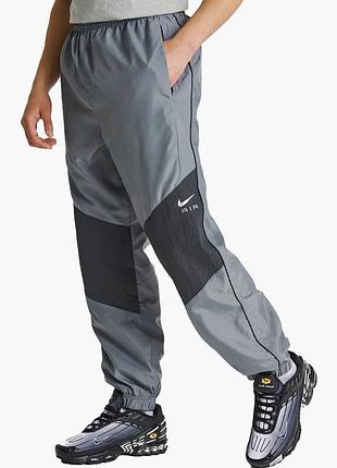 Штани спортивні чоловічі nike air swoosh woven track pants grey fn7688-065