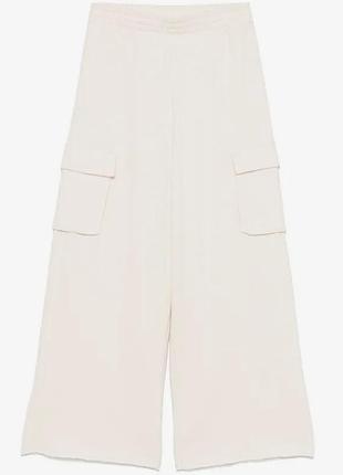 Трикотажні брюки-карго dkny з широкими штанинами (wide-leg), еластичним поясом та необробленим нижнім краєм  у мигдально-бежевому відтінку. xl usa 🇺🇸