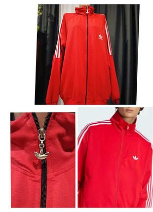 Легка кофта adidas, розмір наш 56-60 колір не такий яскравий,засвідчує камера.