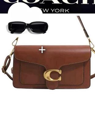 Нова жіноча сумка coach.
