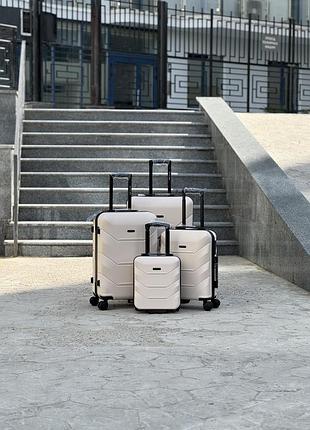 Комплект валіз бежевий з полікарбонату на колесах 4 в 1 mini, s, m, l арт wings 148 (мол) all