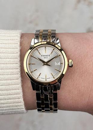 Годинник жіночий tissot t129.210.11.031.00 сріблястий + золотистий  із золотистими індексами