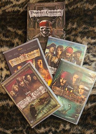 Комплект dvd\ 4 диска\ пираты карибского моря\ лицензия\из Анги\ на английском языке\