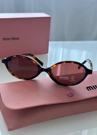 Жіночі коричневі круглі сонцезахисні окуляри miu miu sunglasses miu miu mu 04zs 19p2z1 леопардові окуляри міу міу