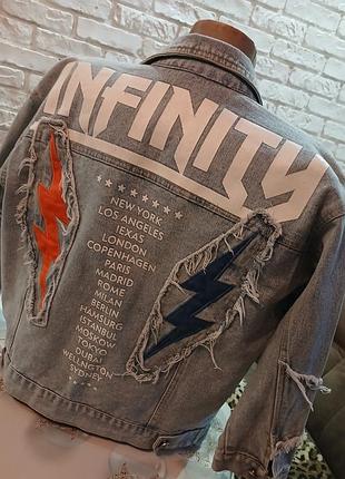 Куртка жіноча джинсовая  infinity ,столицы мира,молнии,рванка