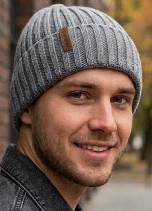 Шапка унісекс сірий меланж з вовною, нова, ідеально для міста і спорту, приємна на дотик і тепла- у складі є вовна, легка і не відчувається.
