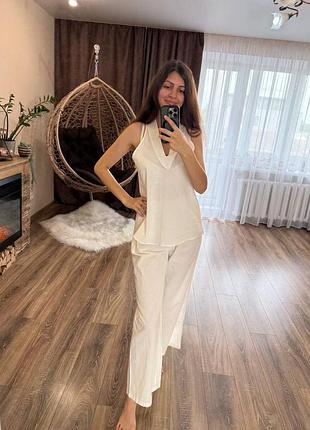 Костюм новый 
одет на параметры 92/63/92, рост 173 см, вес 54 кг
замеры:

длина майки - 66 см
полуобхват груди - 47 см