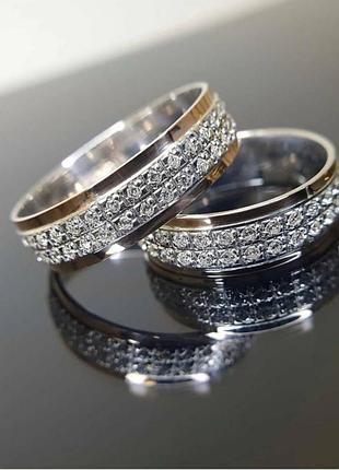Обручки срібло і золото 375 проба фіанітами по колу