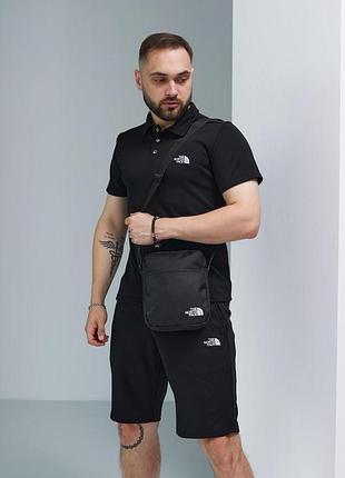 Комплект чоловічий tnf: поло чорне + шорти чорні + барсетка чорна