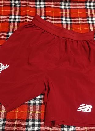 Спортивні шорти футбольні на 8 років new balance