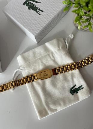 Чоловічий браслет lacoste — золотий, нержавіюча сталь, плетений дизайн із логотипом, стильний аксесуар