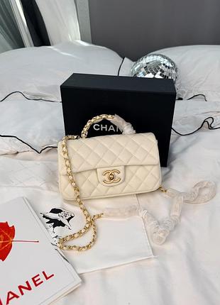 Chanel classic flap top handle caviar cream with gold