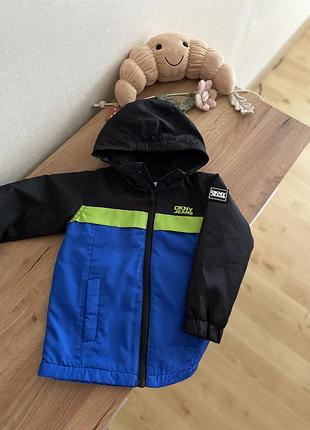 Куртка для хлопчика dkny чорно-синя з зеленими вставками