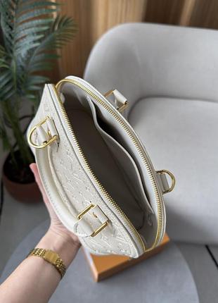 Сумка alma monogram louis empreinte vuitton leather cream 4