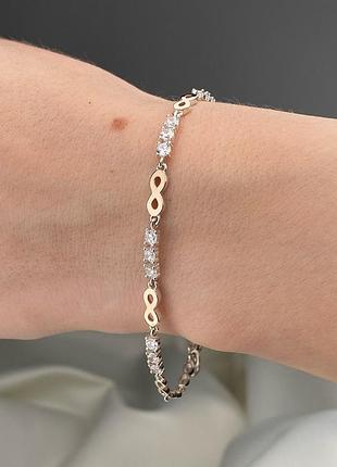 Серебряный женский браслет бесконечность 925 / 375 проба 19.5 см
