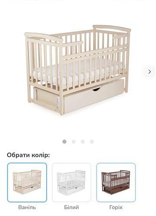 Дитяче ліжко з маятниковим механізмом та матрацом
