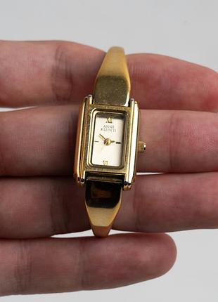Кварцевий жіночий годинник anne klein 2 золотистий