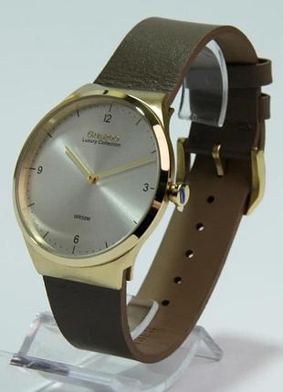 Чоловічий годинник guardo luxury collection s02422-4 золотистий корпус коричневий шкіряний ремінець водозахист 50 м світлий