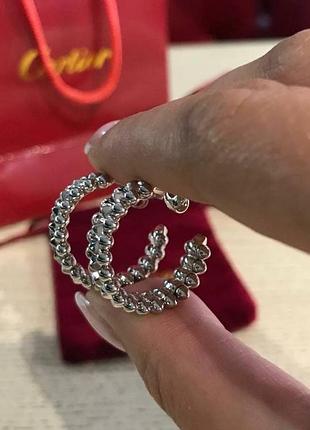 Сережки зубчики cartier 750ua