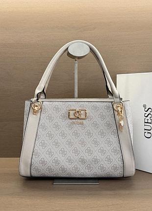 Жіноча сумка guess 252 крос-боді блідо-рожева