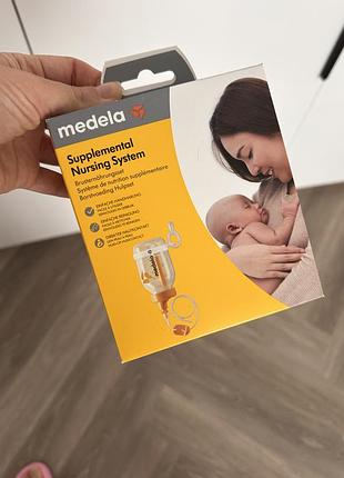 Система для догодовування біля грудей medela supplemental nursing system