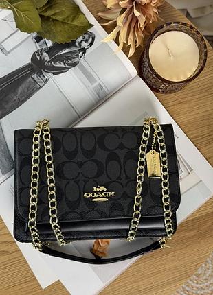 Сумка coach klare crossbody bag in signature canvas черный