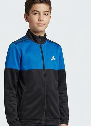 Спортивная олимпийка / кофта на молнии adidas (черно-синяя гамма с фирменными полосками на спине).  
размер: на бирке указан срос 152
