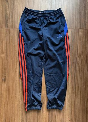 Дитячі спортивні штани adidas сині з помаранчевими смужками