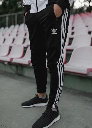 Чоловічі зимові спортивні штани adidas чорні з лампасами на флісі адідас xxl (bon)