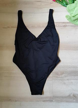 Черный слитный купальник calzedonia