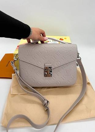 Шкіряна сумочка pochette metis east west greige