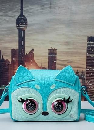 Інтерактивна дитяча сумочка purse pets у бірюзовому кольорі  
дизайн: яскрава дитяча сумочка з фактурної екошкіри бірюзового та світлого відтінків