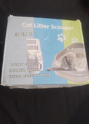 Многофункциональная 3-в-1 лопатка для кошачьего туалета (cat litter scooper) со встроенным контейнером для мусора и отсеком для пакетов.