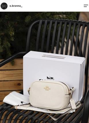 Сумка для жінок coach через плече молочна