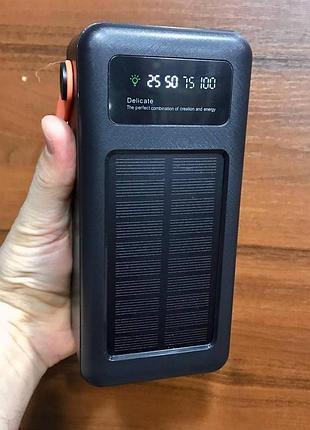 Многофункциональный павербанк на 100000mah с солнечной панелью и встроенными кабелями уже заряжен на 100%