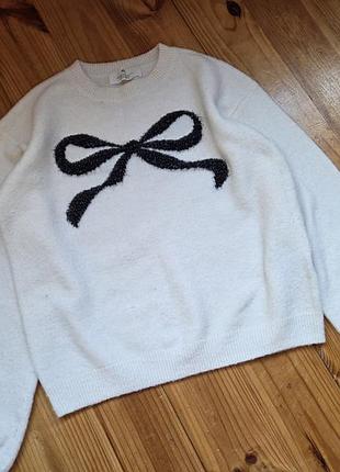Светр для дівчинки h&m білий з бантом