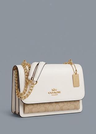 Жіноча сумка klare crossbody bag in signature canvas біла