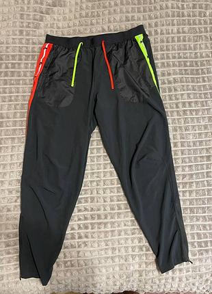 Спортивні штани чоловічі nike phenom wild run dri-fit чорні з неоново-зеленими та помаранчевими вставками